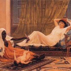 A woman and her nanny taking care of the baby
